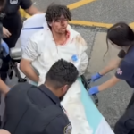 Staten Island teenager Damien Hurstel being loaded onto a stretcher covered in blood